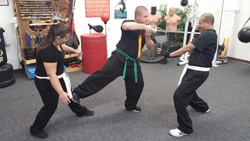 Two Students Sword Fighting